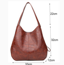 Bolsa Madrid - Couro Premium